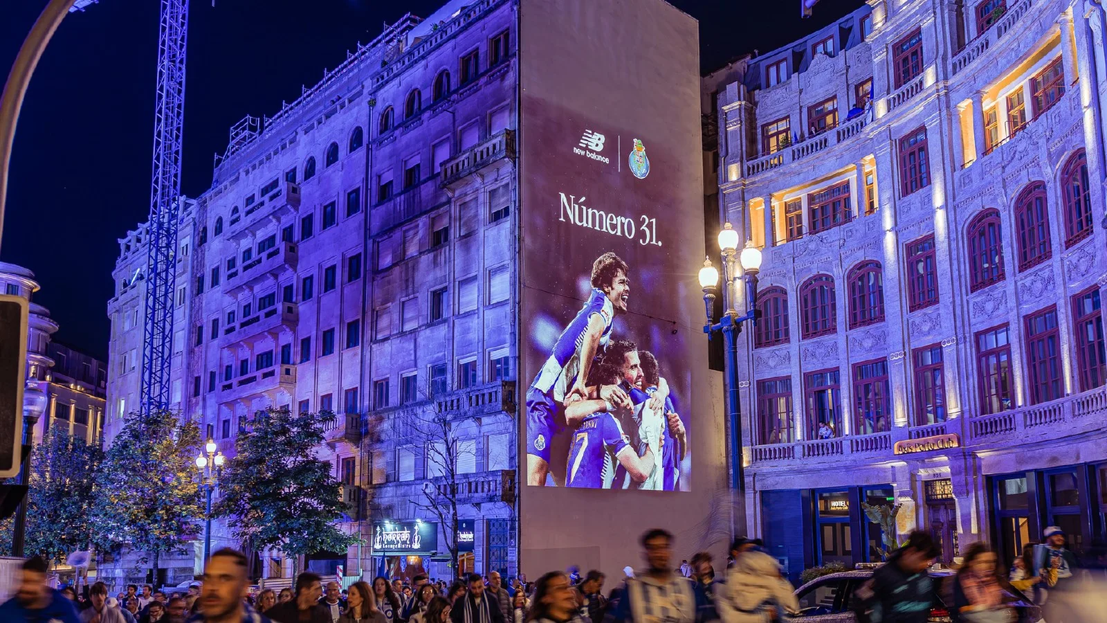Large-scale visual projection on an urban event surface at night